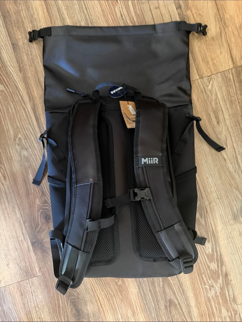 MiiR Black Roll-Top Backpack with Teal Heart Accent, recycled fabric